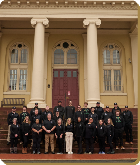 team photo in front of building